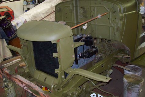 Newly built engine is in place, and now refitting the nose after body work is done